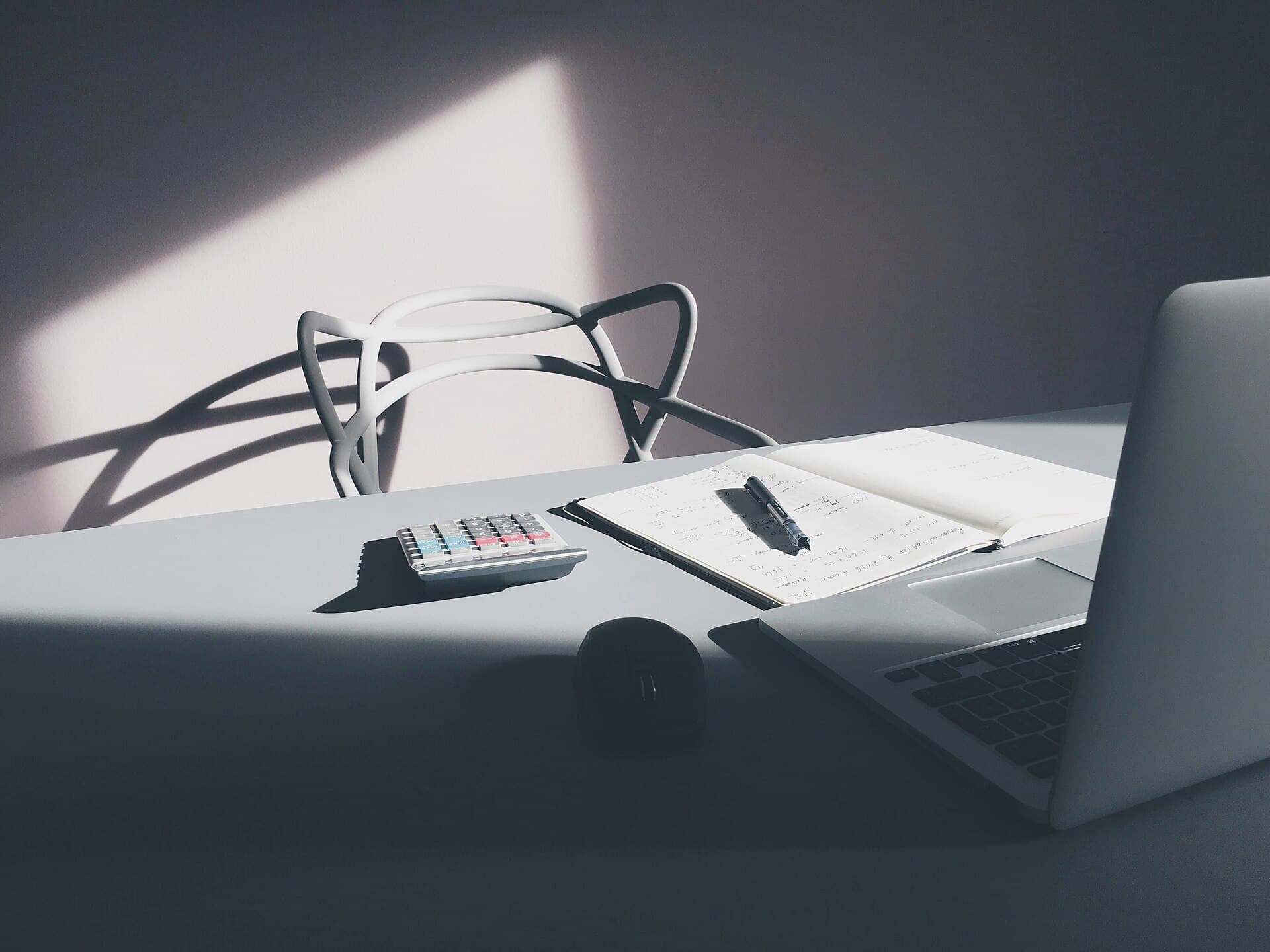 Australian tax documents and a calculator on a desk